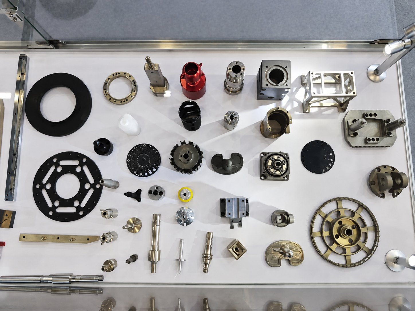 Examples of precision-machined components reviewed during a factory visit in China