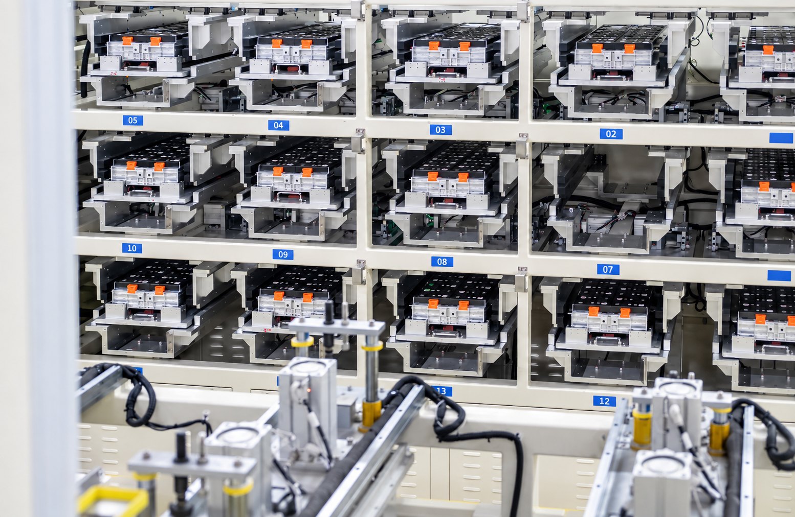 Battery modules positioned within production equipment at a factory in China
