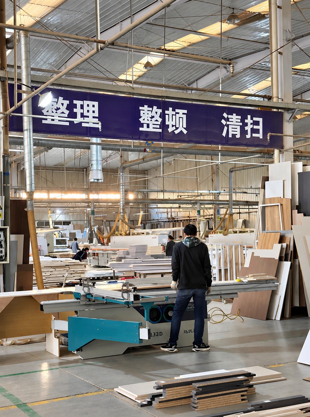 Panel processing area inside a furniture components manufacturing facility